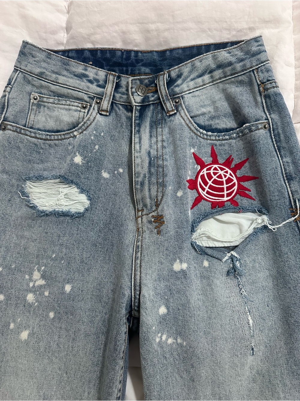 Ksubi Light Blue Distressed Straight Leg Jeans with Red Globe Patch